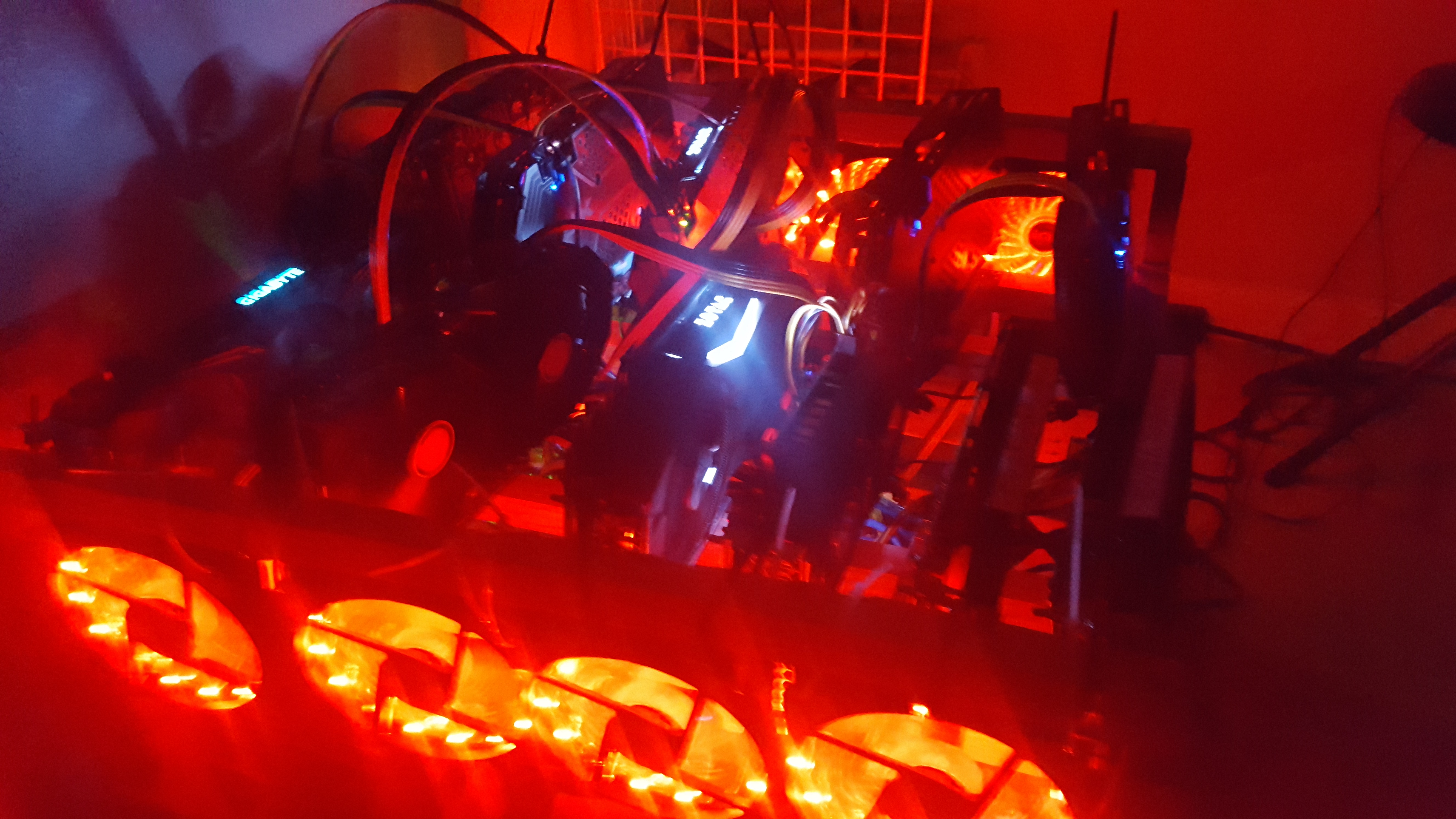 crypto mining rig with red lights